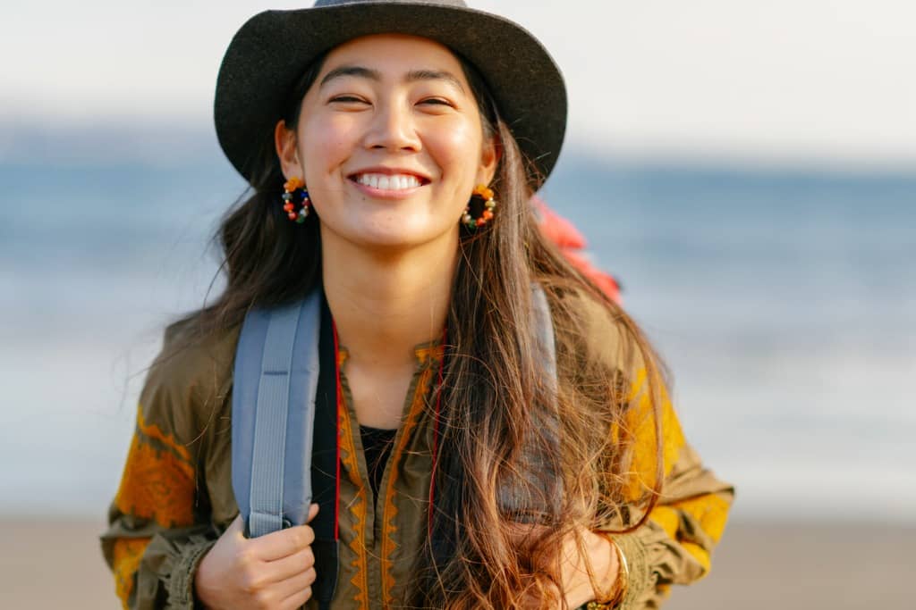 Female backpacker poses for the camera