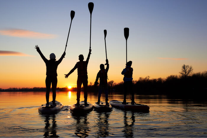 paddleboarding teens